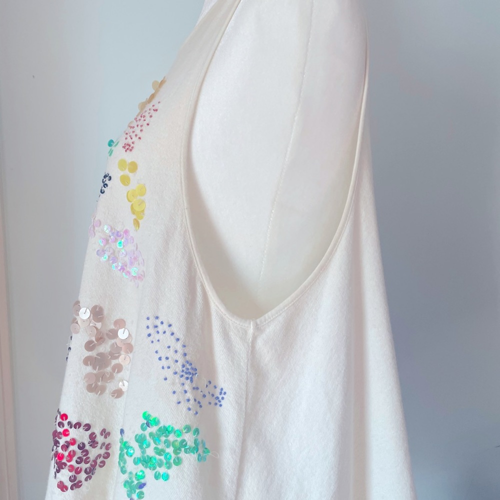 Beaded top, looks great with bralette underneath.